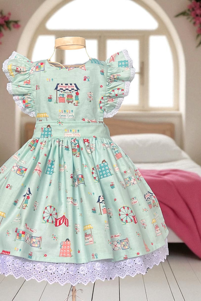 Charlotte Emma Dress
‘Quilt Fair’ in Aqua
By Tasha Noel 
For Riley Blake Designs | Sz 4