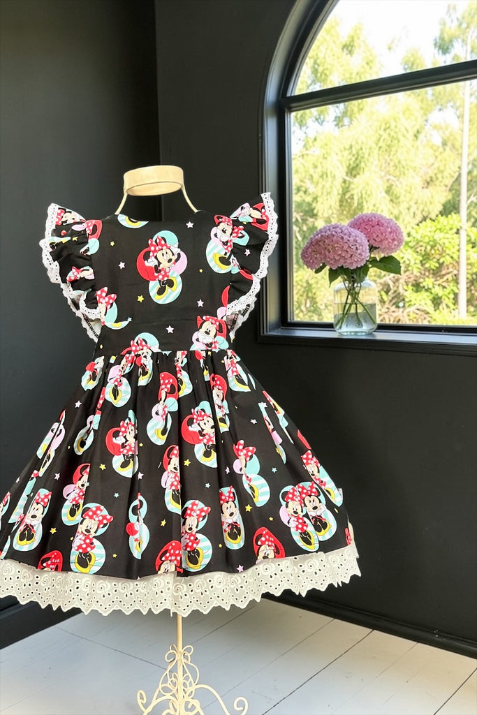Charlotte Emma Dress 
‘Minnie’ in Black
Disney Licensed Fabric by Springs Creative
OOAK ~ Sz 4