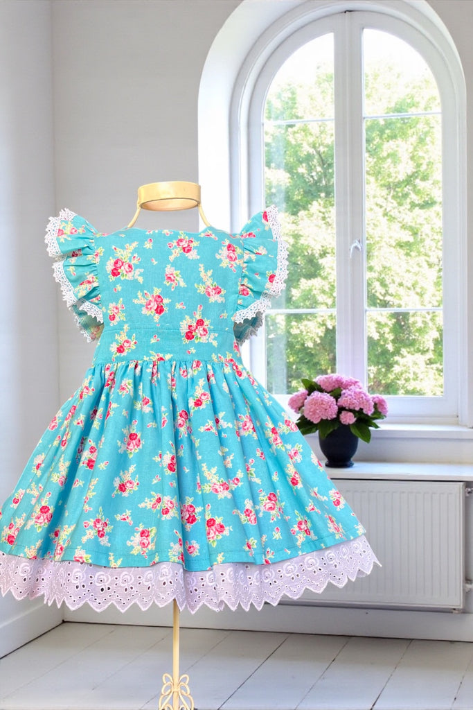 Charlotte Emma Dress 
Small Roses in Sky Blue
From the Flower Sugar Collection 
by Lecien 
OOP ~ Collector’s Fabric 
OOAK ~ Sz 3