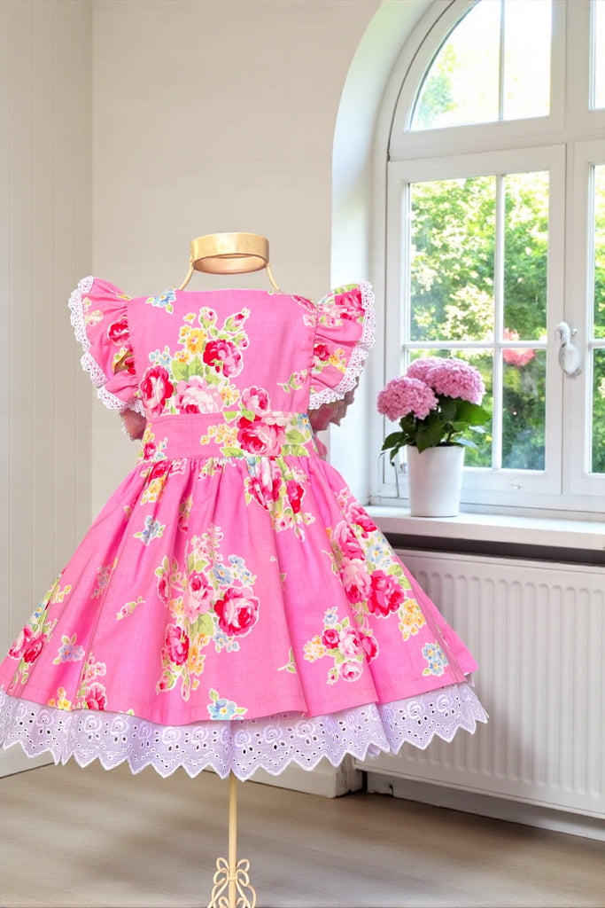 Charlotte Emma Dress 
Large Blooms in Pink
From the Flower Sugar Collection 
by Lecien 
OOP ~ Collector’s Fabric
OOAK ~ Sz 3