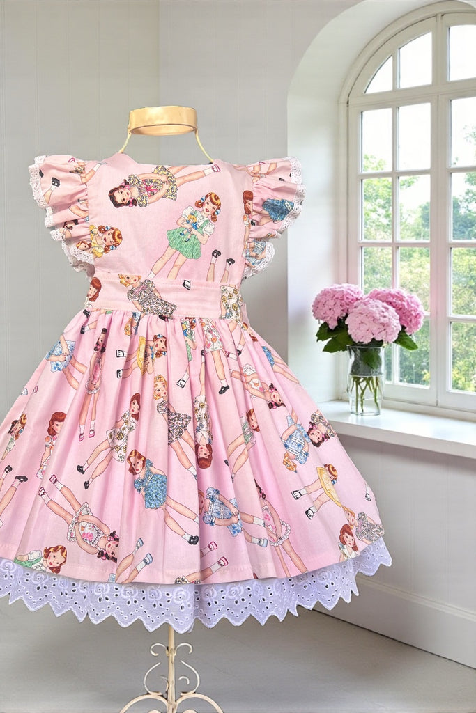 Charlotte Emma Dress
‘Paper Dolls’
By Anna Lena for Timeless Treasures
OOP ~ Collector’s Fabric ~ Sz 4